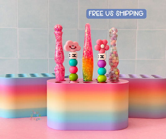 Colorful crochet hooks on a rainbow crochet hook stand.