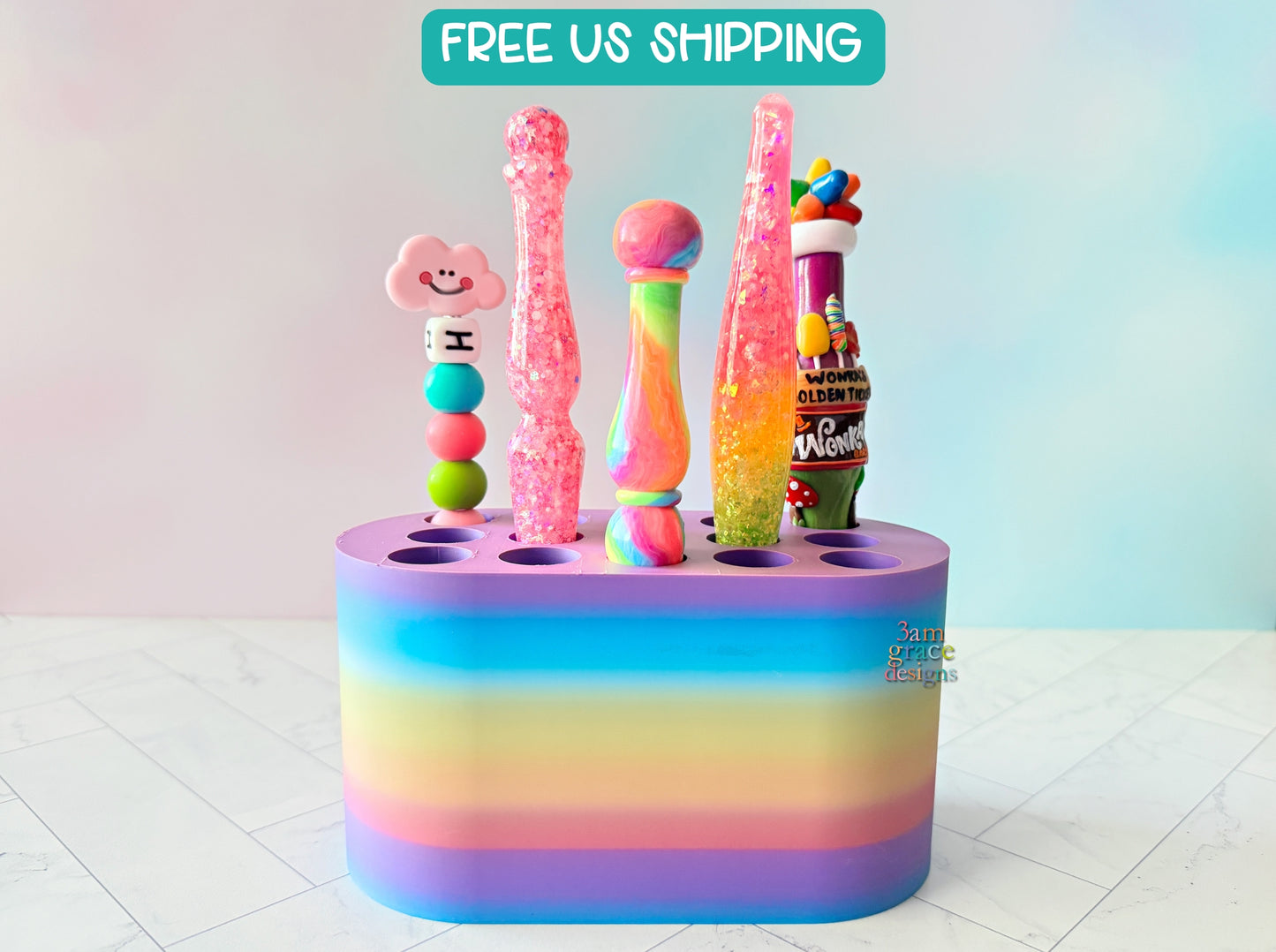 3d printed hook stand to hold crochet hooks. Bright colors pictured with colorful crochet hooks as props.